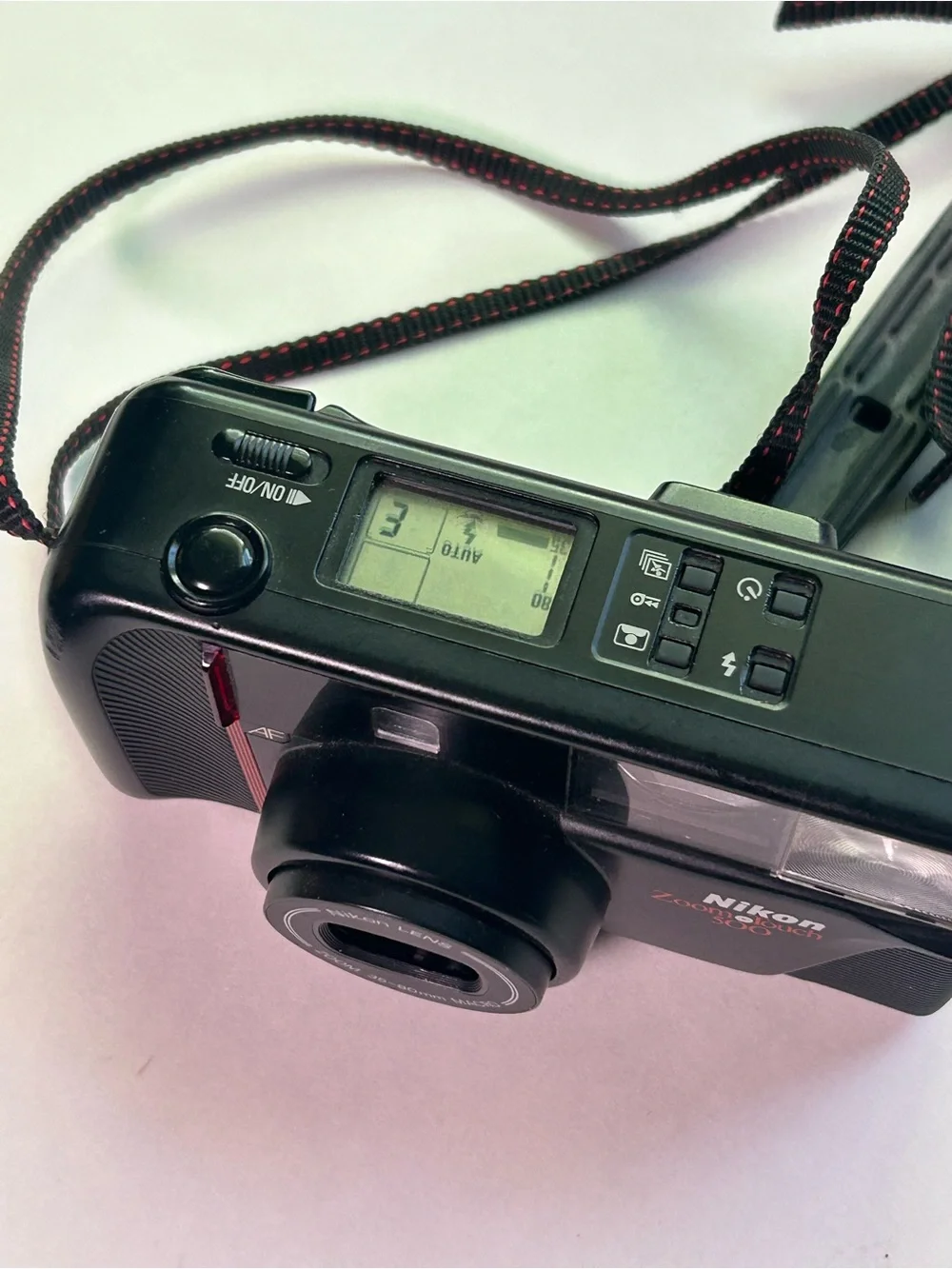 Nikon Zoom Touch 500 Film Camera in Black with Red Accent